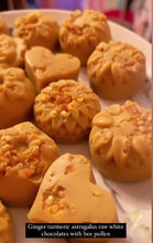 Load and play video in Gallery viewer, Ginger Turmeric Astragalus White Chocolates w/ Bee Pollen
