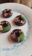 Load and play video in Gallery viewer, Wild Blueberry Elderflower &amp; Mint Raw Mini Tempered Chocolate Donuts
